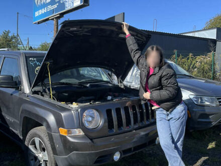 Черный Джип Патриот, объемом двигателя 2.4 л и пробегом 155 тыс. км за 9200 $, фото 1 на Automoto.ua