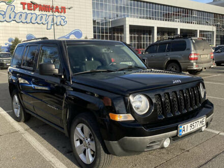 Черный Джип Патриот, объемом двигателя 2.36 л и пробегом 99 тыс. км за 11500 $, фото 1 на Automoto.ua
