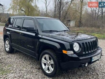 Черный Джип Патриот, объемом двигателя 2.36 л и пробегом 192 тыс. км за 10900 $, фото 1 на Automoto.ua