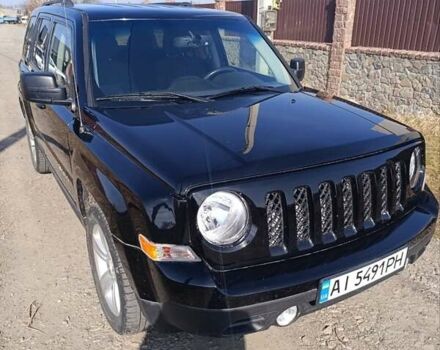 Чорний Джип Patriot, об'ємом двигуна 2 л та пробігом 180 тис. км за 11900 $, фото 1 на Automoto.ua
