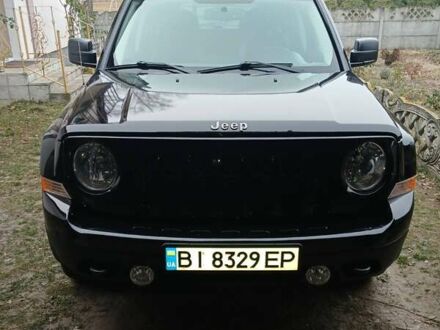 Черный Джип Патриот, объемом двигателя 2.36 л и пробегом 63 тыс. км за 12000 $, фото 1 на Automoto.ua