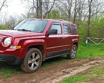 Червоний Джип Patriot, об'ємом двигуна 2.4 л та пробігом 660 тис. км за 13500 $, фото 1 на Automoto.ua