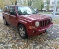 Красный Джип Патриот, объемом двигателя 2.4 л и пробегом 290 тыс. км за 7200 $, фото 1 на Automoto.ua