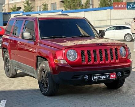 Червоний Джип Patriot, об'ємом двигуна 2.4 л та пробігом 181 тис. км за 8440 $, фото 2 на Automoto.ua