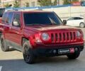 Червоний Джип Patriot, об'ємом двигуна 2.4 л та пробігом 181 тис. км за 8440 $, фото 2 на Automoto.ua