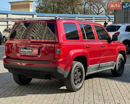 Червоний Джип Patriot, об'ємом двигуна 2.4 л та пробігом 181 тис. км за 8440 $, фото 5 на Automoto.ua