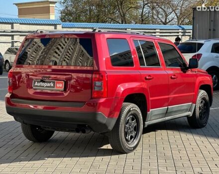 Красный Джип Патриот, объемом двигателя 2.4 л и пробегом 181 тыс. км за 8440 $, фото 5 на Automoto.ua