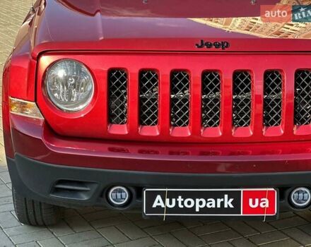 Червоний Джип Patriot, об'ємом двигуна 2.4 л та пробігом 181 тис. км за 8440 $, фото 3 на Automoto.ua
