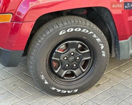 Червоний Джип Patriot, об'ємом двигуна 2.4 л та пробігом 181 тис. км за 8440 $, фото 10 на Automoto.ua