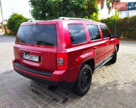 Красный Джип Патриот, объемом двигателя 2.36 л и пробегом 180 тыс. км за 8800 $, фото 6 на Automoto.ua