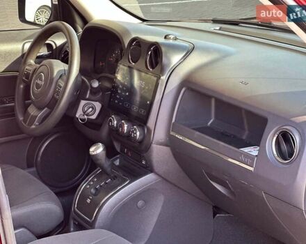 Червоний Джип Patriot, об'ємом двигуна 2.4 л та пробігом 181 тис. км за 8440 $, фото 16 на Automoto.ua