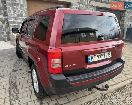 Червоний Джип Patriot, об'ємом двигуна 2.4 л та пробігом 157 тис. км за 9800 $, фото 5 на Automoto.ua