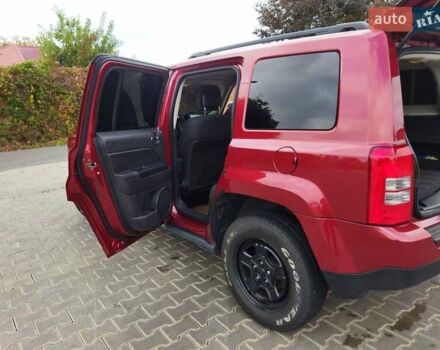 Красный Джип Патриот, объемом двигателя 2.36 л и пробегом 180 тыс. км за 8800 $, фото 12 на Automoto.ua