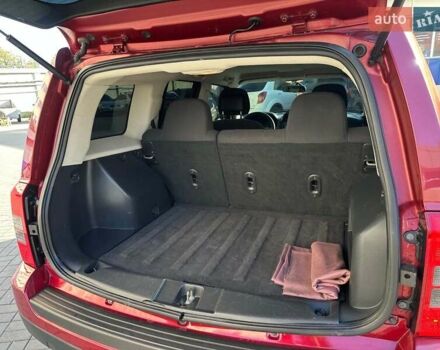 Червоний Джип Patriot, об'ємом двигуна 2.4 л та пробігом 181 тис. км за 8440 $, фото 13 на Automoto.ua