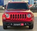 Красный Джип Патриот, объемом двигателя 2.4 л и пробегом 181 тыс. км за 8440 $, фото 1 на Automoto.ua