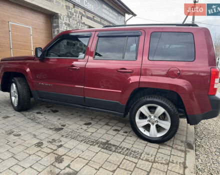 Червоний Джип Patriot, об'ємом двигуна 2.4 л та пробігом 157 тис. км за 9800 $, фото 6 на Automoto.ua