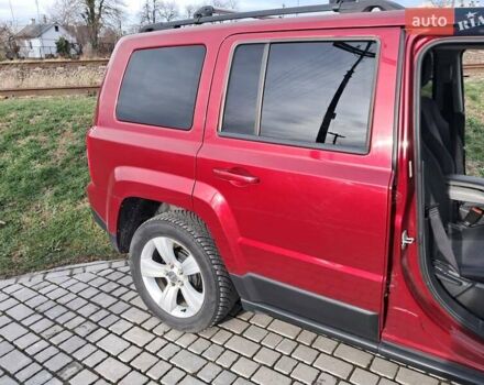 Червоний Джип Patriot, об'ємом двигуна 2.36 л та пробігом 178 тис. км за 9000 $, фото 4 на Automoto.ua