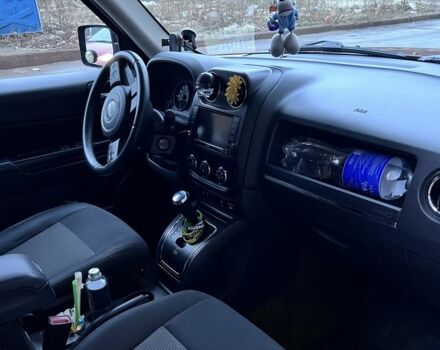 Красный Джип Патриот, объемом двигателя 2.4 л и пробегом 200 тыс. км за 8500 $, фото 7 на Automoto.ua