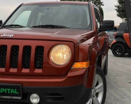 Красный Джип Патриот, объемом двигателя 2.4 л и пробегом 250 тыс. км за 8690 $, фото 2 на Automoto.ua