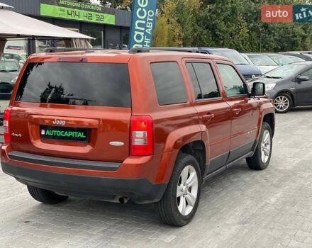 Красный Джип Патриот, объемом двигателя 2.36 л и пробегом 250 тыс. км за 8690 $, фото 5 на Automoto.ua