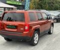 Красный Джип Патриот, объемом двигателя 2.4 л и пробегом 250 тыс. км за 8690 $, фото 5 на Automoto.ua