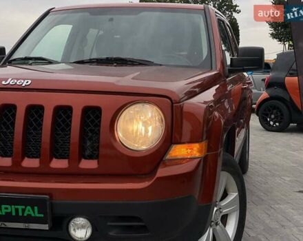 Красный Джип Патриот, объемом двигателя 2.36 л и пробегом 250 тыс. км за 8690 $, фото 2 на Automoto.ua