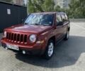 Червоний Джип Patriot, об'ємом двигуна 2.4 л та пробігом 200 тис. км за 8700 $, фото 1 на Automoto.ua