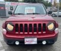 Красный Джип Патриот, объемом двигателя 2.4 л и пробегом 160 тыс. км за 8999 $, фото 1 на Automoto.ua