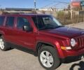 Красный Джип Патриот, объемом двигателя 2.4 л и пробегом 208 тыс. км за 9500 $, фото 1 на Automoto.ua