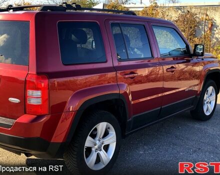 Красный Джип Патриот, объемом двигателя 2.4 л и пробегом 205 тыс. км за 9000 $, фото 2 на Automoto.ua
