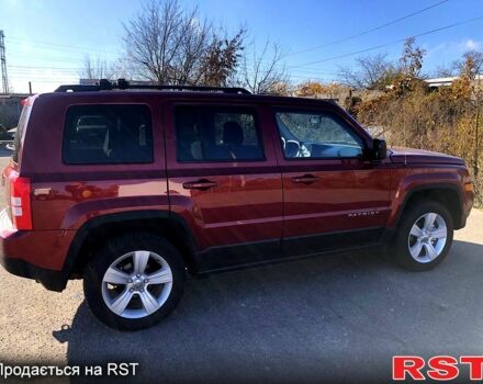 Красный Джип Патриот, объемом двигателя 2.4 л и пробегом 205 тыс. км за 9000 $, фото 6 на Automoto.ua
