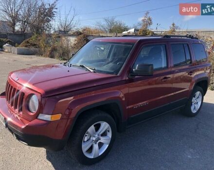 Красный Джип Патриот, объемом двигателя 2.4 л и пробегом 208 тыс. км за 9500 $, фото 3 на Automoto.ua