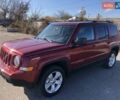 Красный Джип Патриот, объемом двигателя 2.4 л и пробегом 208 тыс. км за 9500 $, фото 3 на Automoto.ua