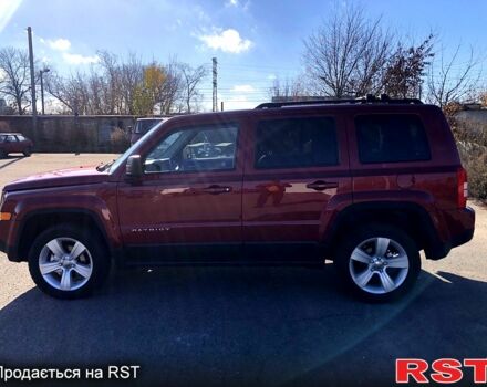 Красный Джип Патриот, объемом двигателя 2.4 л и пробегом 205 тыс. км за 9000 $, фото 7 на Automoto.ua