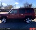 Красный Джип Патриот, объемом двигателя 2.4 л и пробегом 205 тыс. км за 9000 $, фото 7 на Automoto.ua