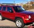Красный Джип Патриот, объемом двигателя 2.4 л и пробегом 205 тыс. км за 9000 $, фото 1 на Automoto.ua