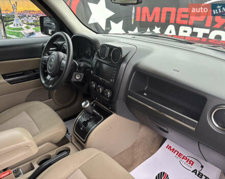 Красный Джип Патриот, объемом двигателя 2.36 л и пробегом 110 тыс. км за 9000 $, фото 7 на Automoto.ua