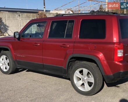 Красный Джип Патриот, объемом двигателя 2.4 л и пробегом 208 тыс. км за 9500 $, фото 2 на Automoto.ua