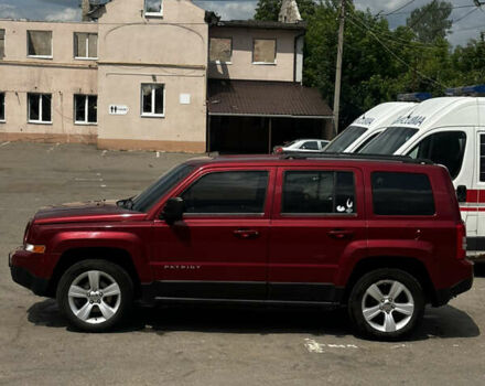 Красный Джип Патриот, объемом двигателя 2.36 л и пробегом 180 тыс. км за 10000 $, фото 2 на Automoto.ua