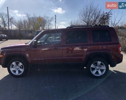 Красный Джип Патриот, объемом двигателя 2.4 л и пробегом 208 тыс. км за 9500 $, фото 6 на Automoto.ua