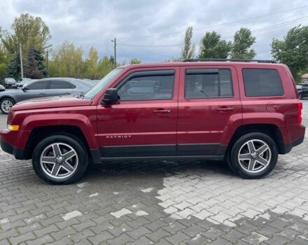 Красный Джип Патриот, объемом двигателя 2.4 л и пробегом 160 тыс. км за 8999 $, фото 3 на Automoto.ua