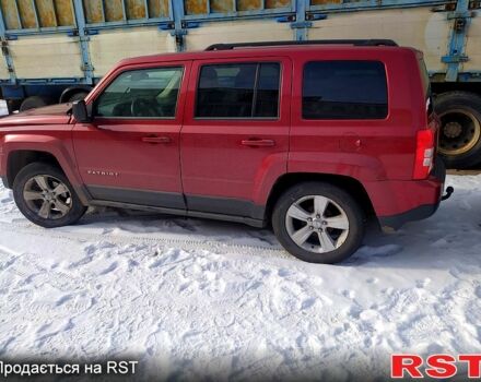 Червоний Джип Patriot, об'ємом двигуна 2.4 л та пробігом 170 тис. км за 6500 $, фото 2 на Automoto.ua