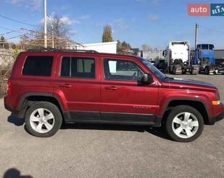 Красный Джип Патриот, объемом двигателя 2.4 л и пробегом 208 тыс. км за 9500 $, фото 5 на Automoto.ua
