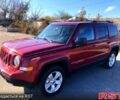 Красный Джип Патриот, объемом двигателя 2.4 л и пробегом 205 тыс. км за 9000 $, фото 1 на Automoto.ua
