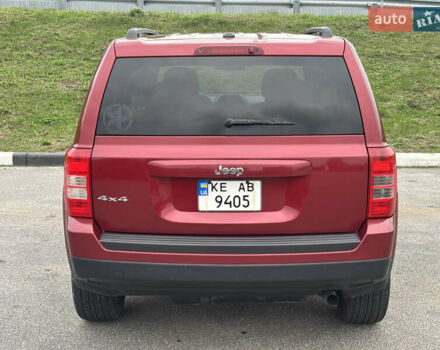 Красный Джип Патриот, объемом двигателя 2.36 л и пробегом 110 тыс. км за 9000 $, фото 4 на Automoto.ua