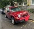 Красный Джип Патриот, объемом двигателя 2.4 л и пробегом 149 тыс. км за 8900 $, фото 1 на Automoto.ua