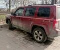 Червоний Джип Patriot, об'ємом двигуна 2.4 л та пробігом 104 тис. км за 8995 $, фото 1 на Automoto.ua