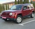 Красный Джип Патриот, объемом двигателя 2.4 л и пробегом 157 тыс. км за 9999 $, фото 1 на Automoto.ua