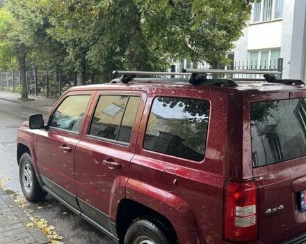 Красный Джип Патриот, объемом двигателя 2.4 л и пробегом 149 тыс. км за 8900 $, фото 2 на Automoto.ua