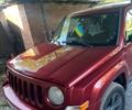 Червоний Джип Patriot, об'ємом двигуна 2.4 л та пробігом 225 тис. км за 9499 $, фото 1 на Automoto.ua